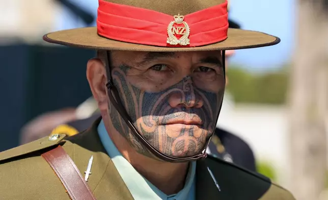 A New Zealand soldier marches during the international service in recognition of the Gallipoli campaign at Mehmetcik monument, a day before ANZAC Day, in the Gallipoli peninsula near Canakkale, Turkey, Friday, April 24, 2026. (Sercan Ozkurnazli/Dia Photo via AP)
