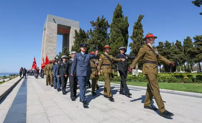 New Zealand soldiers march during the international service in recognition of the Gallipoli campaign at Mehmetcik monument, a day before ANZAC Day, in the Gallipoli peninsula near Canakkale, Turkey, Friday, April 24, 2026. (Sercan Ozkurnazli/Dia Photo via AP)