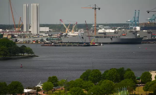 The Dominion Energy Offshore Wind Farm staging area is seen at the Portsmouth Marine terminal Monday, April 13, 2026, in Portsmouth, Va. (AP Photo/Julia Demaree Nikhinson)