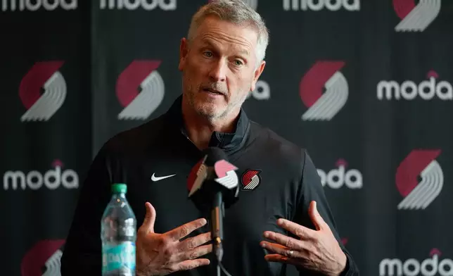 Portland Trail Blazers new owner and governor Tom Dundon speaks during a news conference on Thursday, April 2, 2026, in Portland, Ore. (AP Photo/Jenny Kane)