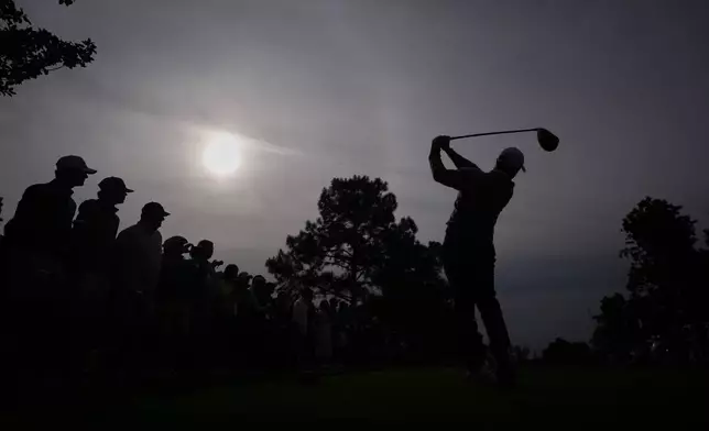 Rory McIlroy, of Northern Ireland, watches his tee shot on the ninth hole during a practice round ahead of the Masters golf tournament at the Augusta National Golf Club, Tuesday, April 7, 2026, in Augusta, Ga. (AP Photo/Matt Slocum)