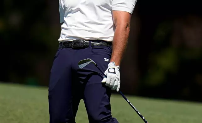 Bryson DeChambeau reacts to his shot from the fairway on the second hole during the second round of the Masters golf tournament at the Augusta National Golf Club, Friday, April 10, 2026, in Augusta, Ga. (AP Photo/Eric Gay)