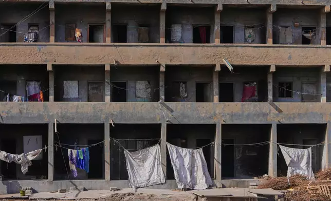 Deserted ceramic workers' quarters are seen following shortage of fuel in Morbi, in the Indian state of Gujarat, Wednesday, April 8, 2026. (AP Photo/Ajit Solanki)