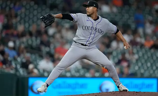Colorado Rockies pitcher Jose Quintana delivers during the first inning of a baseball game against the Houston Astros, Wednesday, April 15, 2026, in Houston. (AP Photo/Kevin M. Cox)