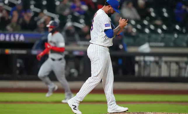 New York Mets pitcher Sean Manaea reacts as Washington Nationals' Brady House runs the bases after hitting a grand slam during the fourth inning of a baseball game Wednesday, April 29, 2026, in New York. (AP Photo/Frank Franklin II)