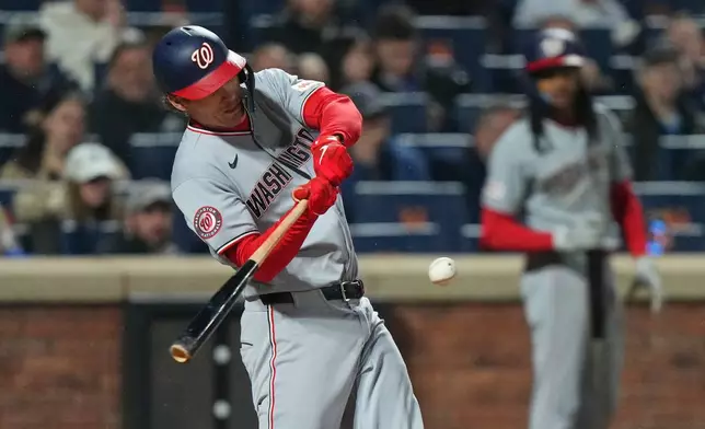 Washington Nationals' Brady House hits a grand slam during the fourth inning of a baseball game against the New York Mets Wednesday, April 29, 2026, in New York. (AP Photo/Frank Franklin II)