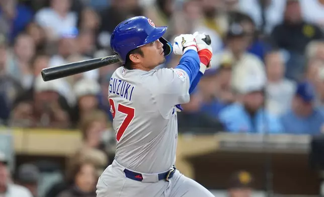 Chicago Cubs' Seiya Suzuki watches his home run during the second inning of a baseball game against the San Diego Padres Monday, April 27, 2026, in San Diego. (AP Photo/Gregory Bull)