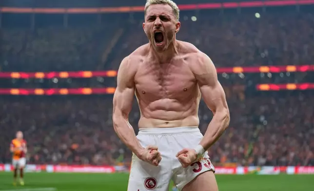 Galatasaray's Baris Yilmaz celebrates after scoring his side's second goal during a Turkish Super Lig soccer match between Galatasaray and Fenerbahce in Istanbul, Turkey, Sunday, April 26, 2026. (AP Photo/Khalil Hamra)