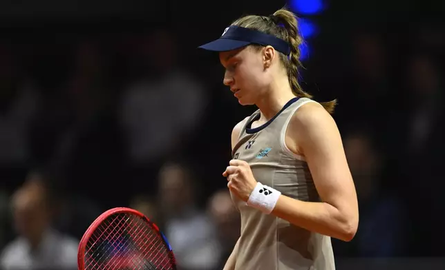 Kazakhstan's Elena Rybakina reacts to winning a point as she plays against Czech Republic's Karolina Muchova, during the women's final match at the Stuttgart Open tennis tournament, in Stuttgart, Germany, Sunday, April 19, 2026. (Marijan Murat/dpa via AP) CORRECTION:name corrected to Elena instead of Jelena