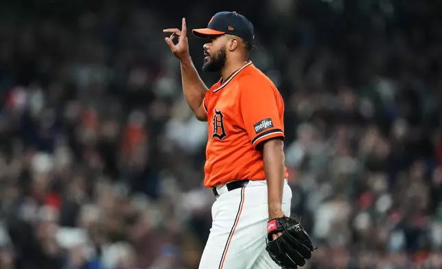 Detroit Tigers pitcher Kenley Jansen reacts to the final out against the Miami Marlins during the ninth inning of a baseball game Friday, April 10, 2026, in Detroit. (AP Photo/Paul Sancya)