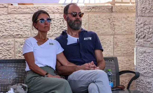 FILE - Jonathan Polin and Rachel Goldberg, parents of Israeli-American hostage Hersh Goldberg-Polin, who was killed in Hamas captivity in the Gaza Strip, attend their son's funeral in Jerusalem, Monday, Sept. 2, 2024. (Gil Cohen-Magen/Pool via AP, File)