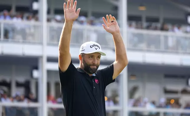First-place individual champion captain Jon Rahm, of Legion XIII, celebrates on the 18th green after the final round of LIV Golf Mexico City at Club de Golf Chapultepec, Sunday, April 19, 2026, in Naucalpan, Mexico. (Jon Ferrey/LIV Golf via AP)