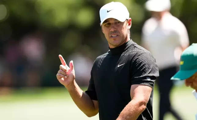 Brooks Koepka walks to green on the first hole during the final round of the Masters golf tournament at the Augusta National Golf Club, Sunday, April 12, 2026, in Augusta, Ga. (AP Photo/Matt Slocum)