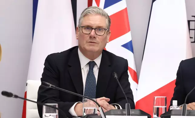 British Prime Minister Keir Starmer co-hosts a multinational virtual summit with French President Emmanuel Macron, not pictured, at the Elysee Presidential Palace in Paris, Friday April 17, 2026 (Tom Nicholson/Pool Photo via AP)