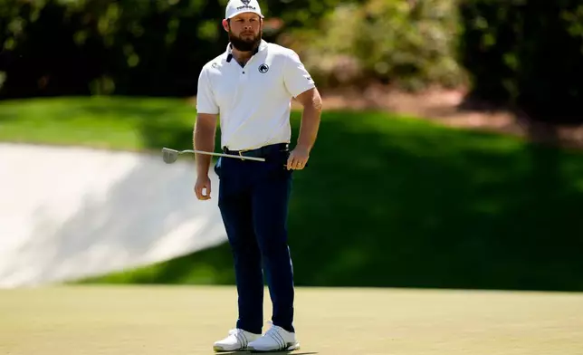 Tyrrell Hatton, of England, reacts after missing a putt on the 13th hole during the second round of the Masters golf tournament at the Augusta National Golf Club, Friday, April 10, 2026, in Augusta, Ga. (AP Photo/Matt Slocum)