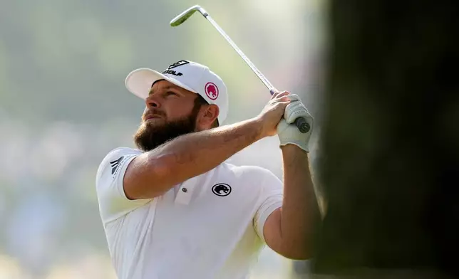 Tyrrell Hatton, of England, watches his shot on the second hole during the second round of the Masters golf tournament at the Augusta National Golf Club, Friday, April 10, 2026, in Augusta, Ga. (AP Photo/Gerald Herbert)