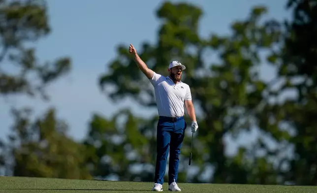 Tyrrell Hatton, of England, reacts to his shot on the second hole during the second round of the Masters golf tournament at the Augusta National Golf Club, Friday, April 10, 2026, in Augusta, Ga. (AP Photo/Eric Gay)