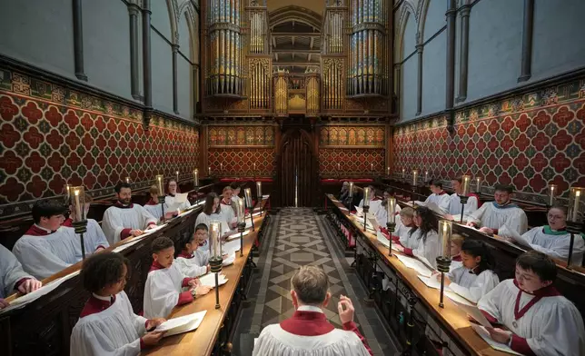 Britain Choral Music Choristers sing during Evensong at Rochester Cathedral in Rochester, England, Friday, March 27, 2026. (AP Photo/Kin Cheung)