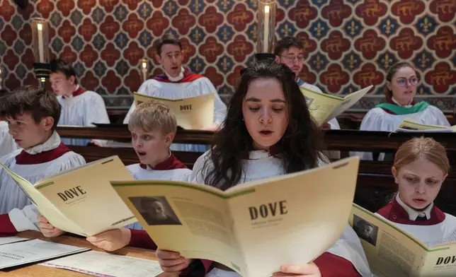 Britain Choral Music Choristers sing during Evensong at Rochester Cathedral in Rochester, England, Friday, March 27, 2026. (AP Photo/Kin Cheung)