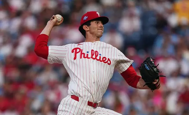 Philadelphia Phillies' Andrew Painter pitches during the first inning of a baseball game against the Washington Nationals, Tuesday, March 31, 2026, in Philadelphia. (AP Photo/Matt Rourke)