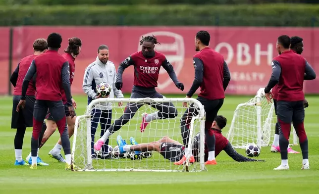 Arsenal's Eberechi Eze, center, during a training session in London, Tuesday, April 28, 2026. (John Walton/PA via AP)