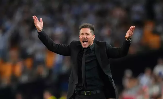 Atletico Madrid's head coach Diego Simeone reacts during the Copa del Rey final soccer match between Atletico Madrid and Real Sociedad in Seville, Spain, Saturday, April. 18, 2026. (AP Photo/Jose Breton)