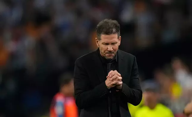 Atletico Madrid's head coach Diego Simeone reacts during the Copa del Rey final soccer match between Atletico Madrid and Real Sociedad in Seville, Spain, Saturday, April. 18, 2026. (AP Photo/Jose Breton)