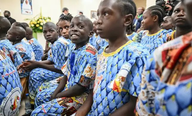 A child smiles as Pope Leo XIV, not pictured, visits the Ngul Zamba (Power of God) orphanagein Yaounde, Cameroon, Wednesday April 15, 2026 on the third day of his apostolic journey to Africa. (Alberto Pizzoli, Pool Photo via AP)