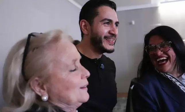 Rep. Debbie Dingell, D-Mich., left, Abdul El-Sayed, a progressive candidate in the Democratic primary for U.S. Senate in Michigan, center, and Rep. Rashida Tlaib, D-Mich., speak during a campaign event for El-Sayed, Tuesday, April 7, 2026, at the University of Michigan in Ann Arbor, Mich. (AP Photo/Julia Demaree Nikhinson)