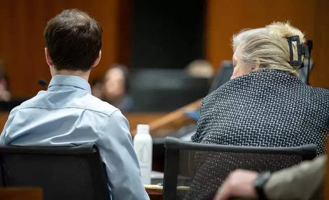 Tyler Robinson, accused in the fatal shooting of Charlie Kirk, and defense attorney Kathryn Nester attend a hearing in 4th District Court in Provo, Utah, on Friday, April 17, 2026. (Trent Nelson /The Salt Lake Tribune via AP, Pool)