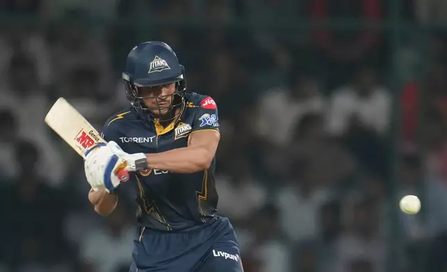 Gujarat Titans' captain Shubman Gill plays a shot during the Indian Premier League cricket match between Delhi Capitals and Gujarat Titans in New Delhi, India, Wednesday, April. 8, 2026. (AP Photo/ Manish Swarup)