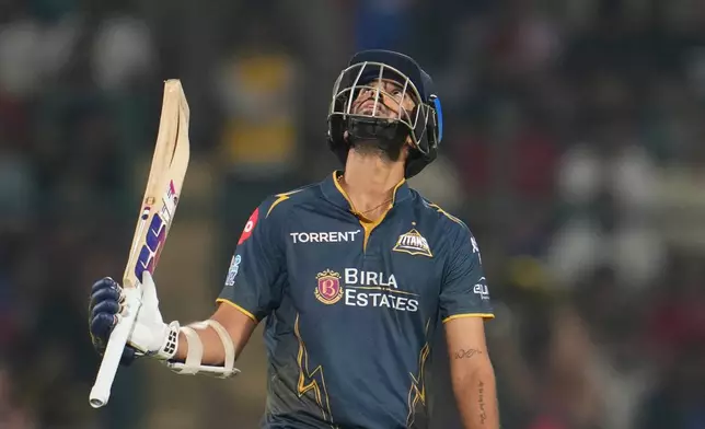 Gujarat Titans' Washington Sundar celebrates his fifty runs during the Indian Premier League cricket match between Delhi Capitals and Gujarat Titans in New Delhi, India, Wednesday, April. 8, 2026. (AP Photo/ Manish Swarup)