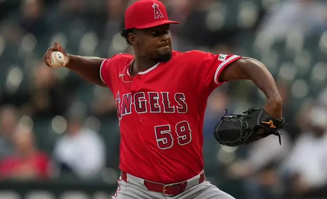 Los Angeles Angels starting pitcher José Soriano (59) throws against the Chicago White Sox during the first inning of a baseball game Tuesday, April 28, 2026, in Chicago. (AP Photo/Erin Hooley)