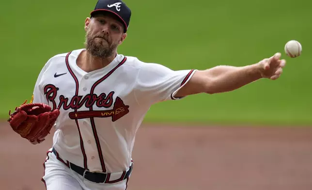 Atlanta Braves pitcher Chris Sale (51) deleivers against the Athletics in the first inning of a baseball game, Wednesday, April 1, 2026, in Atlanta. (AP Photo/Mike Stewart)