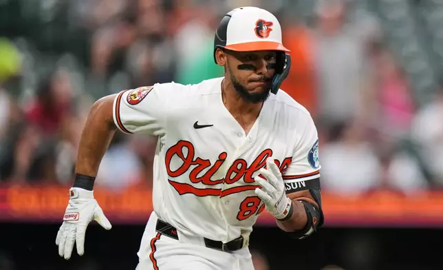 Baltimore Orioles' Jeremiah Jackson advances toward first base after hitting a single during the second inning of a baseball game against the Arizona Diamondbacks, Tuesday, April 14, 2026, in Baltimore. (AP Photo/Stephanie Scarbrough)