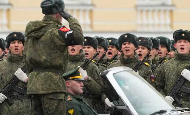 Troops attend a rehearsal for the Victory Day military parade at the Dvortsovaya (Palace) Square in St. Petersburg, Russia, Tuesday, April 28, 2026. (AP Photo/Dmitri Lovetsky)
