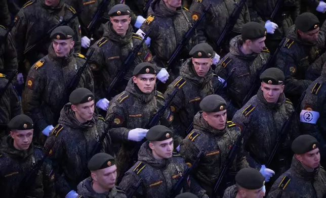 Russian servicemen stand in a formation prior to the Victory Day military parade rehearsal in Moscow, Wednesday, April 29, 2026. (AP Photo/Pavel Bednyakov)