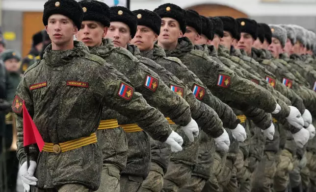 Troops march during a rehearsal for the Victory Day military parade at the Dvortsovaya (Palace) Square in St. Petersburg, Russia, Tuesday, April 28, 2026. (AP Photo/Dmitri Lovetsky)