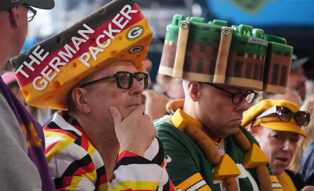 Mike Seavert, left, and Matthias Kraus watch during third day of the NFL football draft, Saturday, April 25, 2026, in Pittsburgh. (AP Photo/Gene J. Puskar)