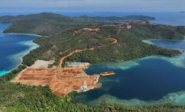 In this image provided by Auriga Nusantara, deforested land is visible where nickel mining takes place on Kawe Island, Indonesia, Dec. 21, 2024. (Auriga Nusantara via AP)