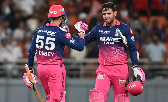 Rajasthan Royals' Donovan Ferreira, right, and Rajasthan Royals' Shubham Dubey celebrates after they won the Indian Premier League cricket match against Punjab Kings in New Chandigarh, India, Tuesday, April 28, 2026.(AP Photo)