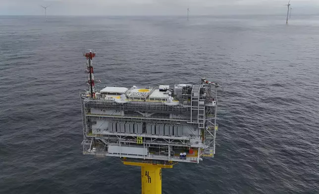 The Revolution Wind central hub or substation for the offshore wind farm is visible Thursday, April 23, 2026, off the coast of Rhode Island. (AP Photo/Joshua A. Bickel)