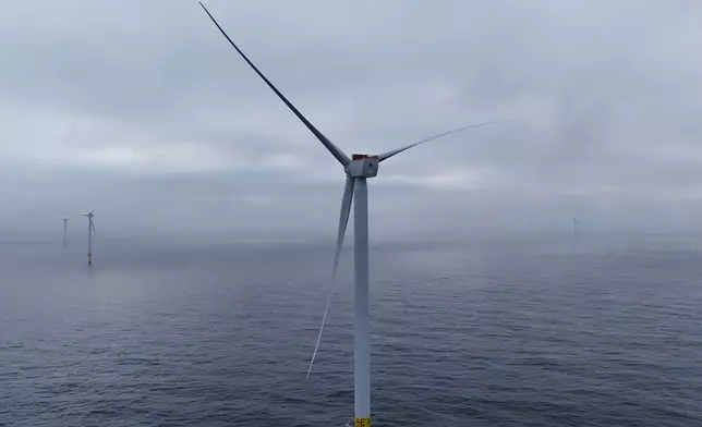 Turbines are visible at Revolution Wind offshore wind farm that is under construction off the coast of Rhode Island, Thursday, April 23, 2026. (AP Photo/Joshua A. Bickel)