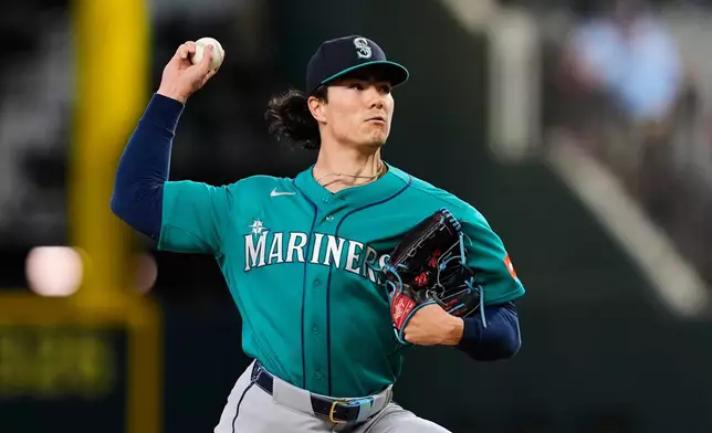 Seattle Mariners pitcher Bryan Woo throws to the Texas Rangers in the first inning of a baseball game Wednesday, April 8, 2026, in Arlington, Texas. (AP Photo/Tony Gutierrez)