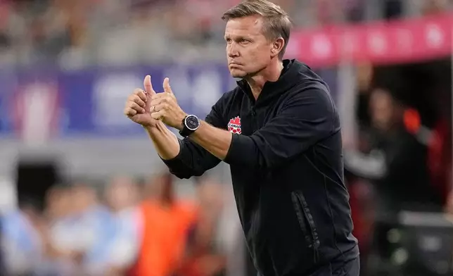 FILE - Canada head coach Jesse Marsch reacts to a play during a Copa America quarterfinal soccer match between Venezuela and Canada in Arlington, Texas, Friday, July 5, 2024. (AP Photo/Tony Gutierrez, File)