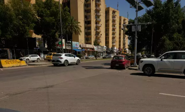 A street view shows the street corner in central Baghdad's Saadoun Street where U.S. journalist Shelly Kittleson was kidnapped in central Baghdad, Iraq, Wednesday, April 1 2026. (AP Photo/ Hadi Mizban)
