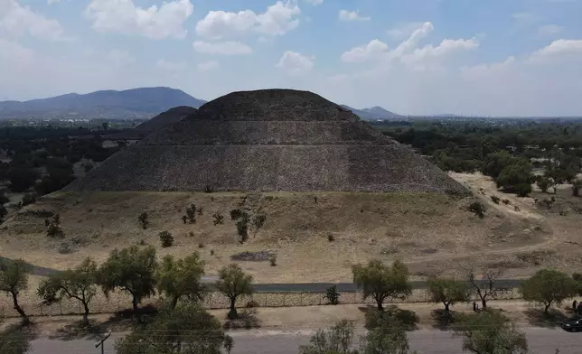 The Pyramid of the Moon at Teotihuacan remains closed to visitors a day after a gunman opened fire on tourists at the archaeological site on the outskirts of Mexico City, Tuesday, April 21, 2026.. (AP Photo/Marco Ugarte)