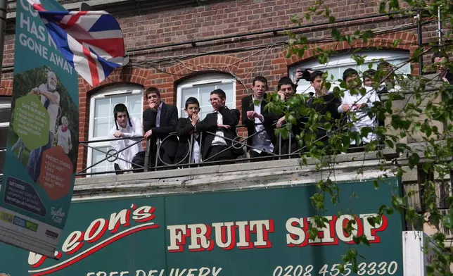 People look over the area where two people were stabbed in Golders Green neighbourhood, that has a large Jewish community, in London, Wednesday, April 29, 2026.(AP Photo/Kin Cheung)