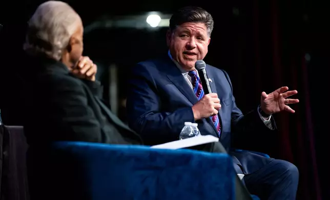 Illinois Gov. J.B. Pritzker speaks at the National Action Network Convention, accompanied by the Rev. Al Sharpton, in New York, Thursday, April 9, 2026. (AP Photo/Angelina Katsanis)