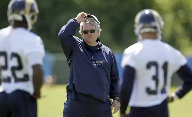 FILE - St. Louis Rams assistant head coach Dave McGinnis watches during NFL football minicamp, April 17, 2012, at the team's training facility in St. Louis. (AP Photo/Jeff Roberson, File)